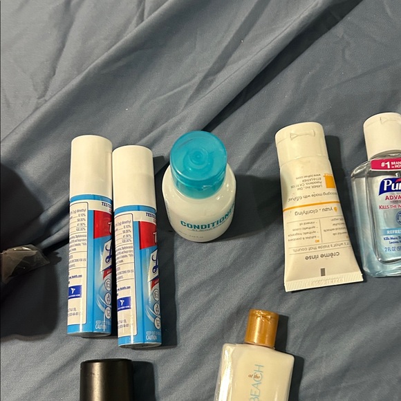 Vibrant Pink Toiletry Bag with Zipper and travel items. - Picture 3 of 14